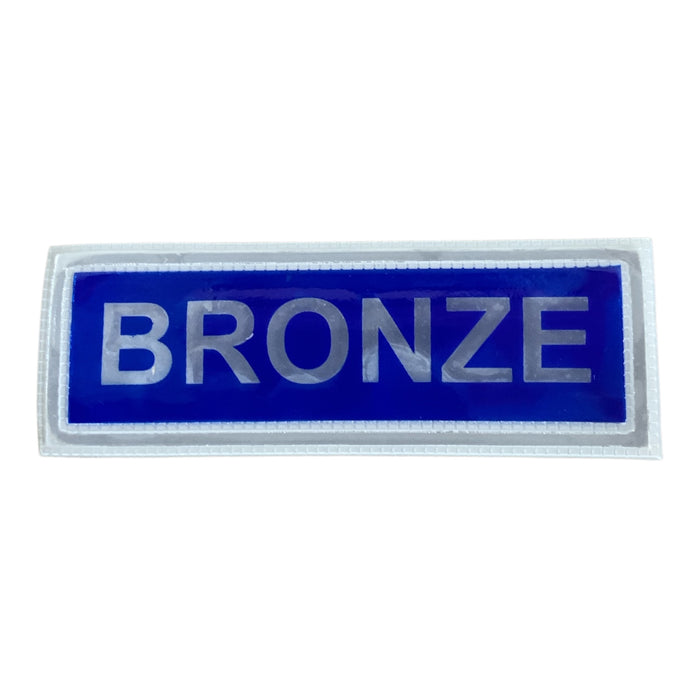 Encapsulated Reflective Bronze Badge Sew On